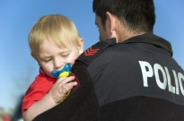 Police Officer Holds baby
